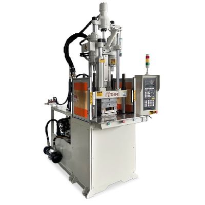 Verticale spuitgietmachine voor het maken van mobiele opladers