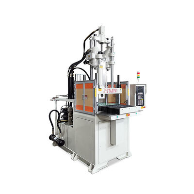 Verticale spuitgietmachine voor het maken van lepel
