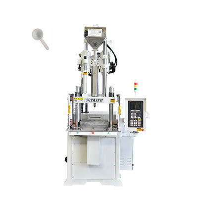 Verticale spuitgietmachine voor het maken van lepel