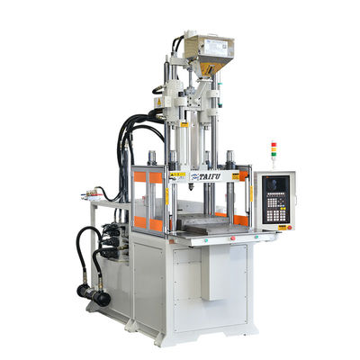 Verticale spuitgietmachine voor het maken van lepel