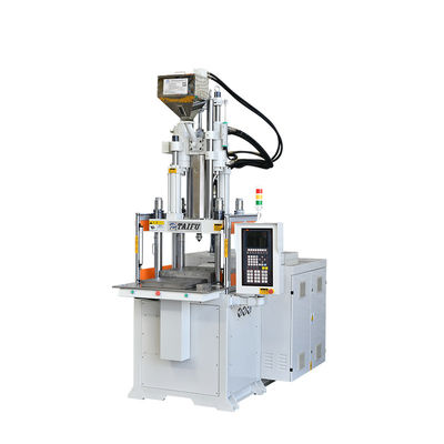 Verticale spuitgietmachine voor het maken van lepel