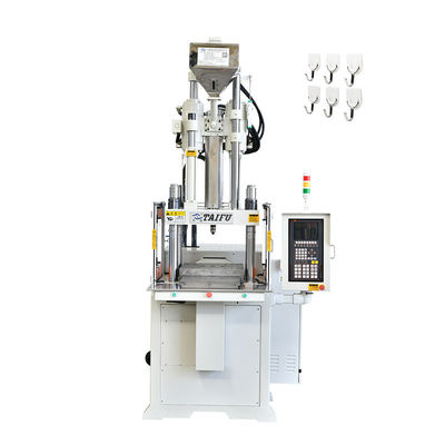 Verticale spuitgietmachine voor het maken van haak