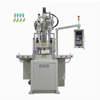 Verticale spuitgietmachine voor het maken van nagels