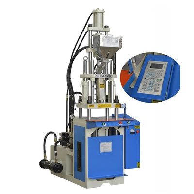 Verticale injectievormmachine voor het maken van elektronische integratoren