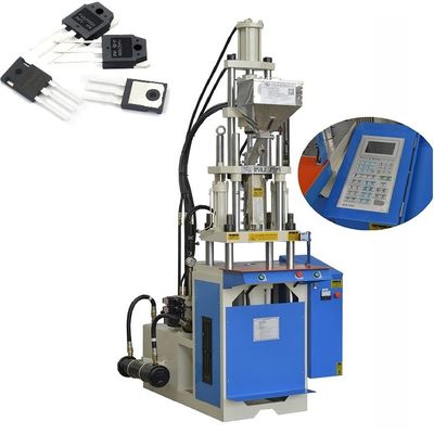 Verticale injectievormmachine voor het maken van elektronische integratoren